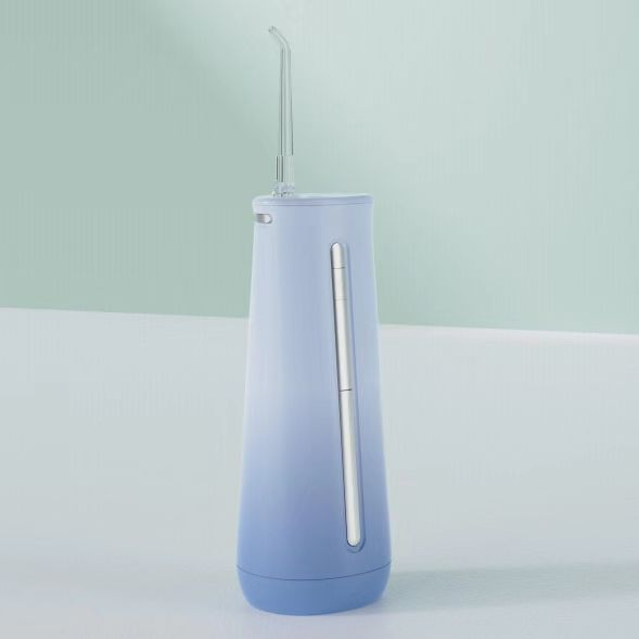 How often should you use an oral irrigator dental?
