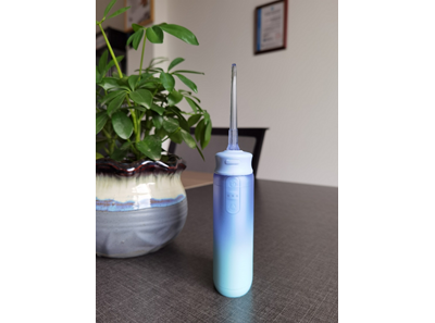 The oral irrigator, also known as "water flosser,"